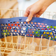 Designed to hold all of your small plastic kitchen gear on the top rack, Dr. Brown’s Silicone Dishwasher Bag is like a laundry bag for your dishwasher.